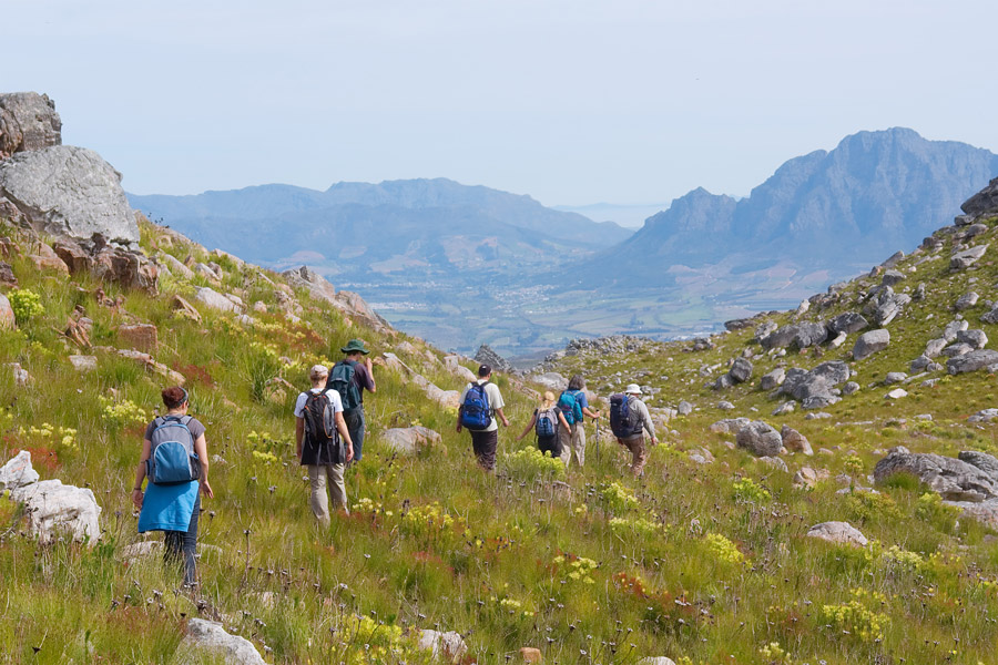 Group hiking thru the mountains